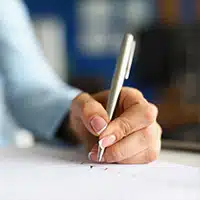 Woman Filling Out A Form