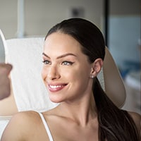 A Woman Posing For The Camera